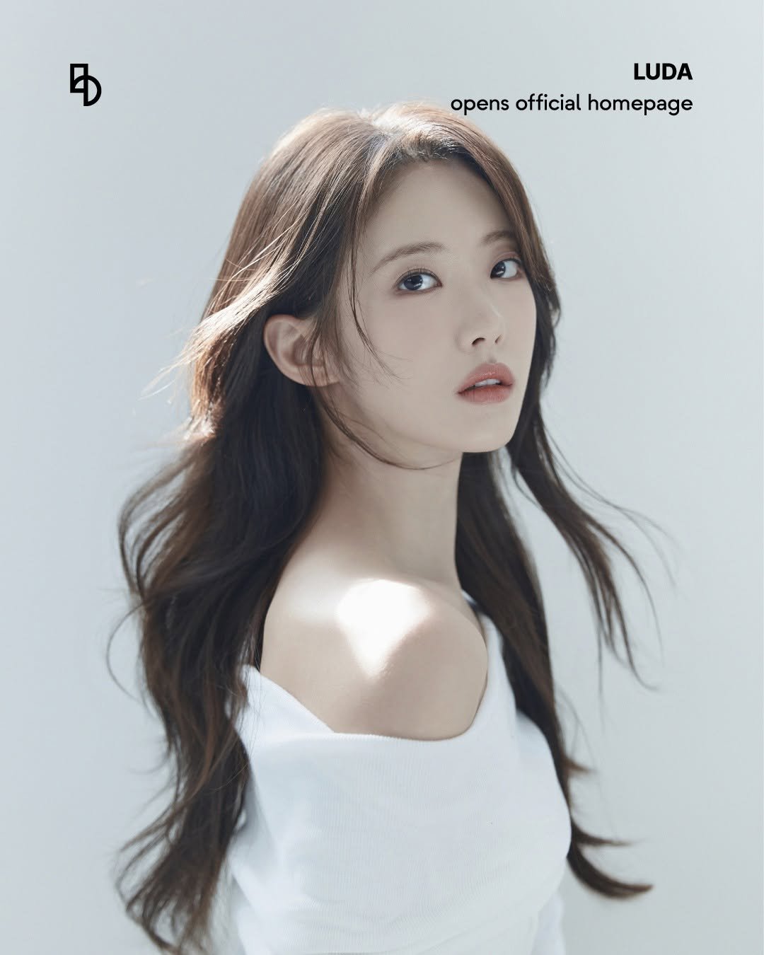 Photo shared by b.stage｜비스테이지 on July 02, 2025 tagging @e_lludda. May be an image of one or more people, hair, poster and top.