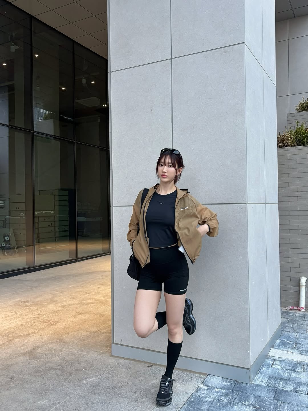 Photo shared by 이식로그🫧 on April 13, 2026 tagging @hdex__official, and @hdex_women. May be an image of standing, miniskirt, costume and text.
