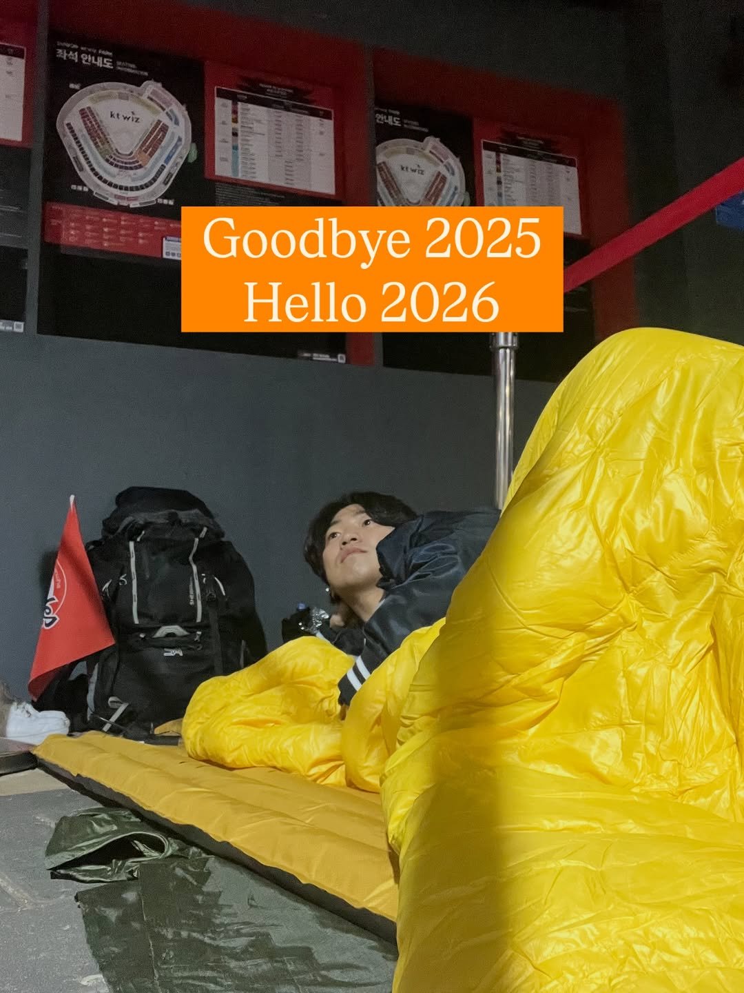 Photo shared by 이글스토리ㅣ한화의 이야기를 들려줄게 on December 31, 2025 tagging @s_dong9999. May be an image of campsite, goosedown coat, beanbag chair, punching bag, parka, raincoat and text that says '-口 Goodbye 2025 Hello Hello2026 2026'.