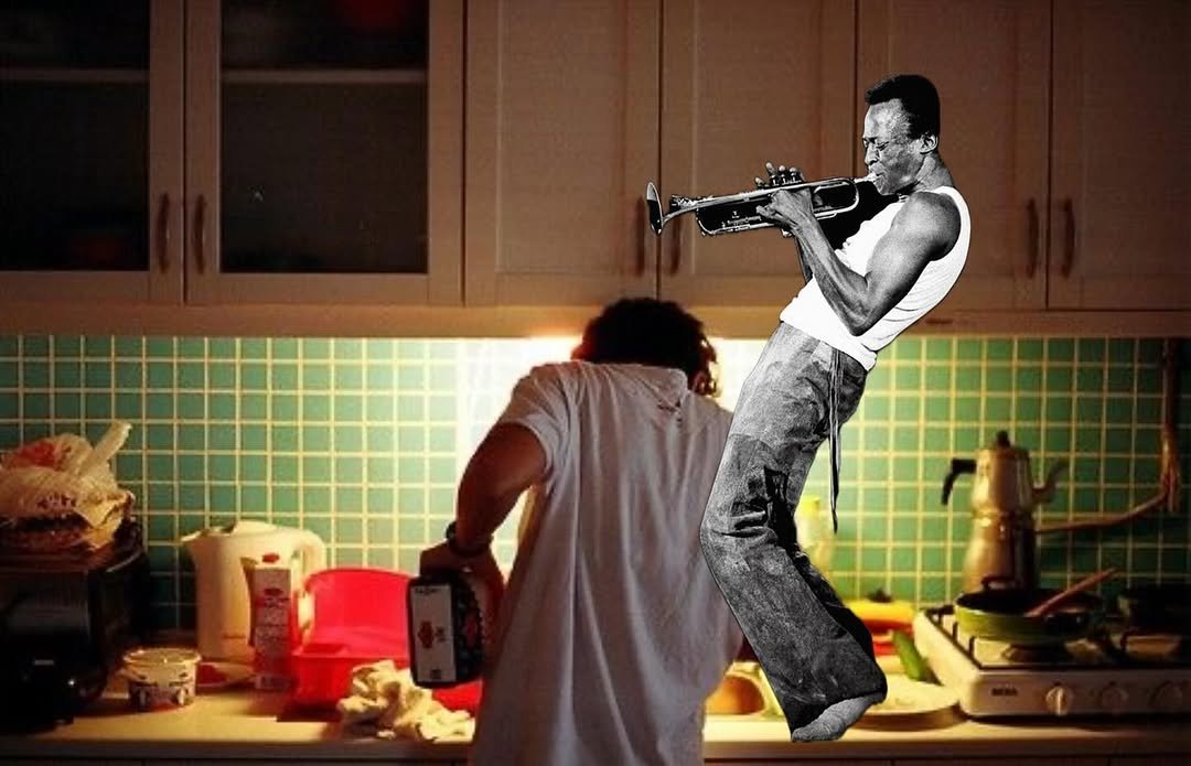 Photo by Echo in Eco on August 05, 2025. May be an image of 2 people, saxophone, refrigerator, microwave, spatula and text.