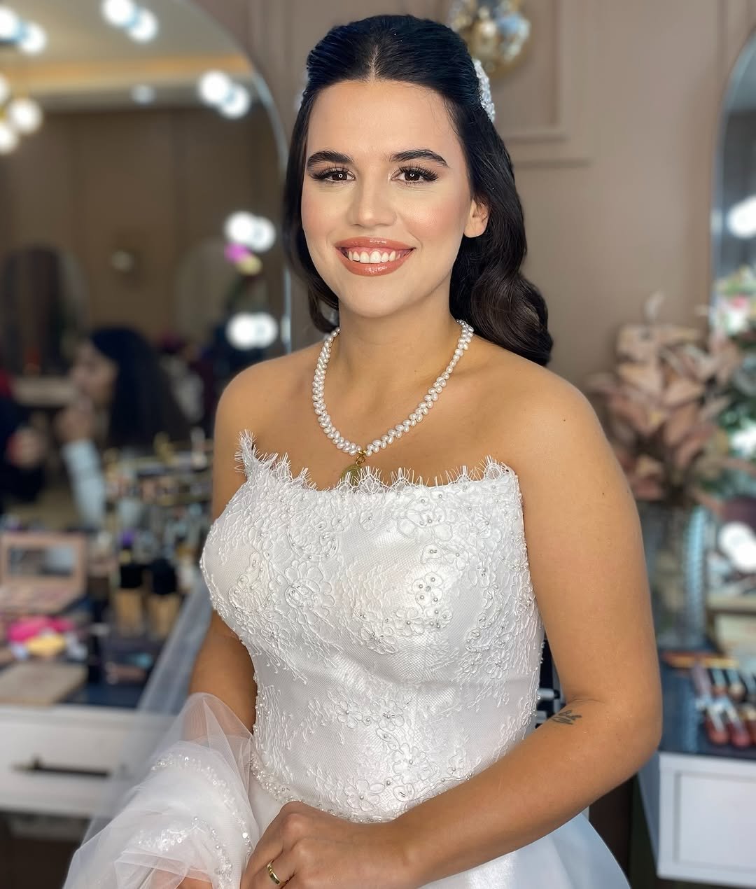 Photo by Nazlı Akköse on March 28, 2026. May be an image of one or more people, makeup, eyeliner, hair, dress and text.