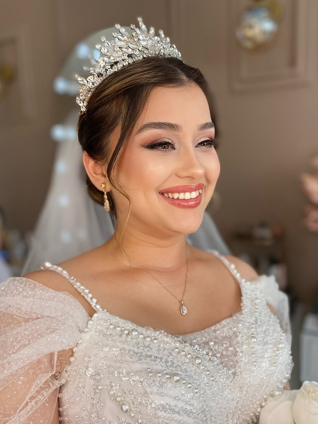 Photo by Nazlı Akköse on April 26, 2026. May be an image of one or more people, makeup, hair, dress, wedding and text.