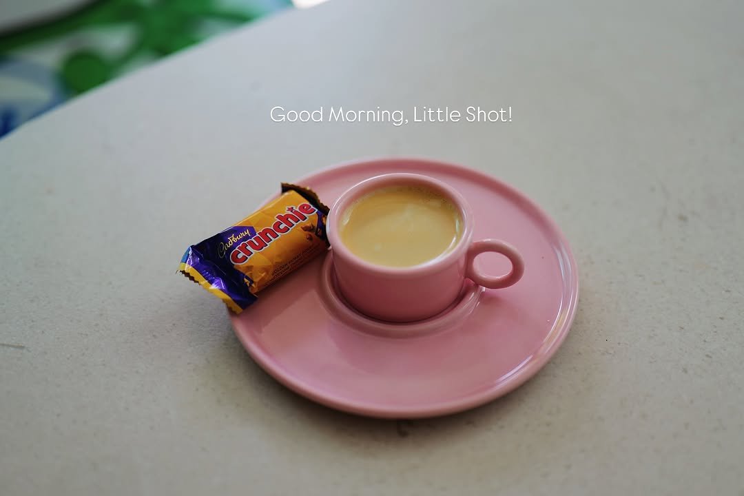 Photo by 화가이모 on September 20, 2025. May be an image of coffee cup, coffee, cappuccino, wafer, saucer and text that says 'Good Morning, GoodMorning,LittleShot! Little Shot! woury srunchle crunchie'.