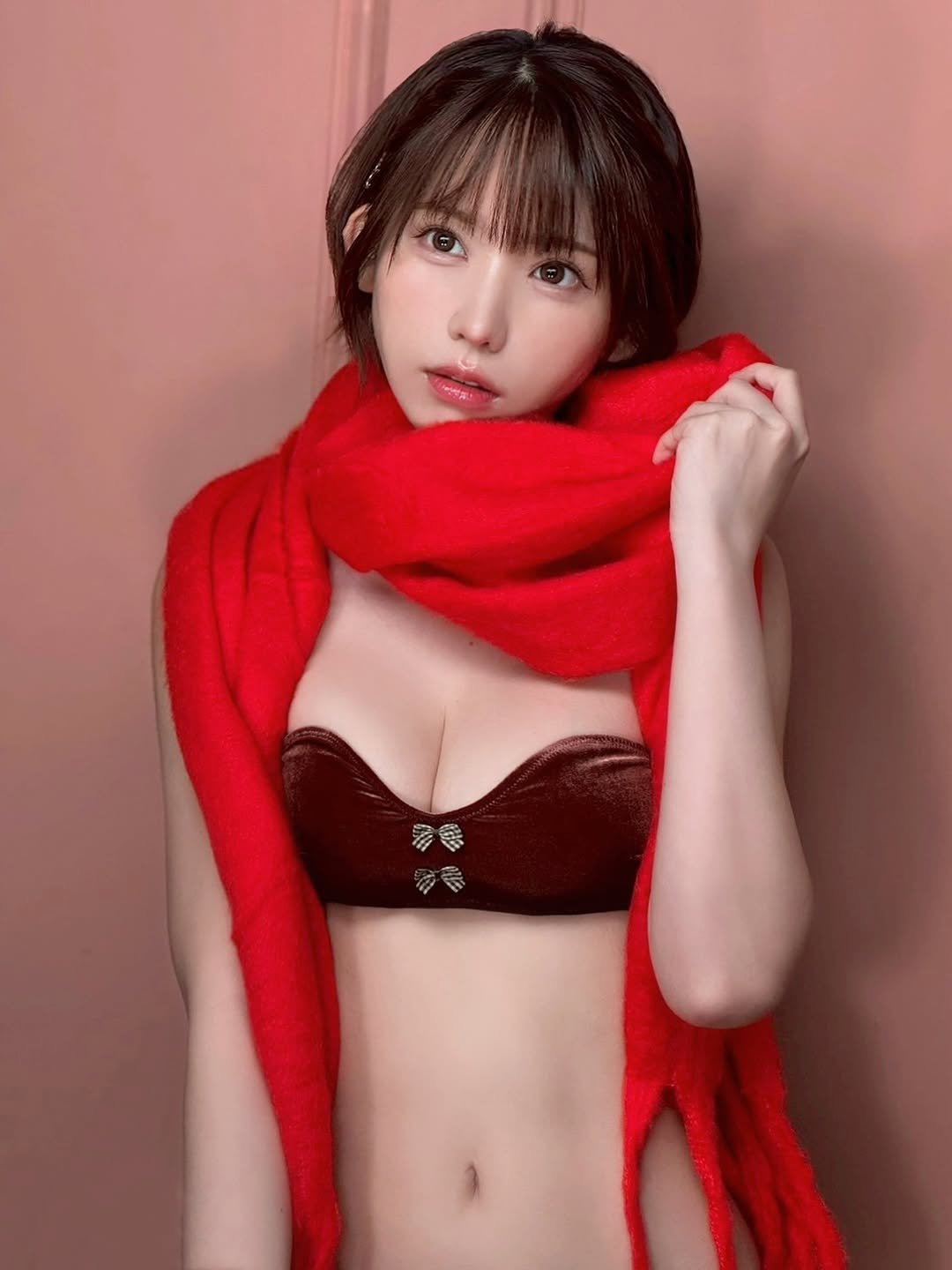 Photo by えなこ(Enako) on February 10, 2026. May be an image of one or more people, hair, bath robe, bra and text.