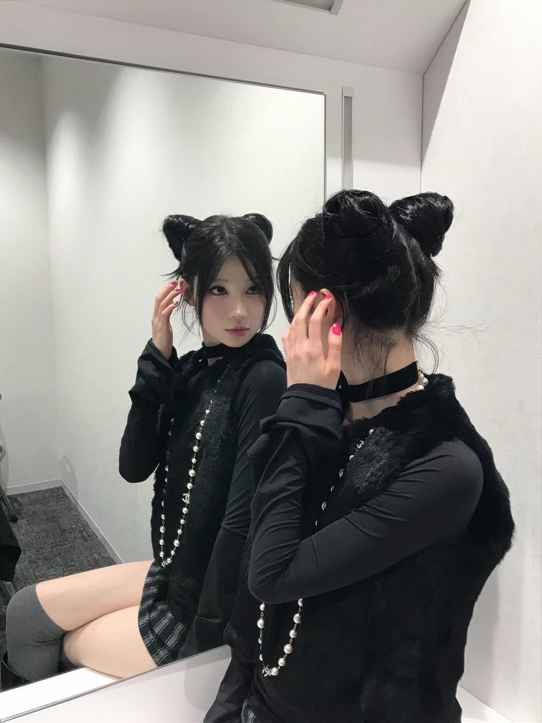 Photo by ENAMI ASA on November 24, 2025. May be an image of mirror, costume and text.