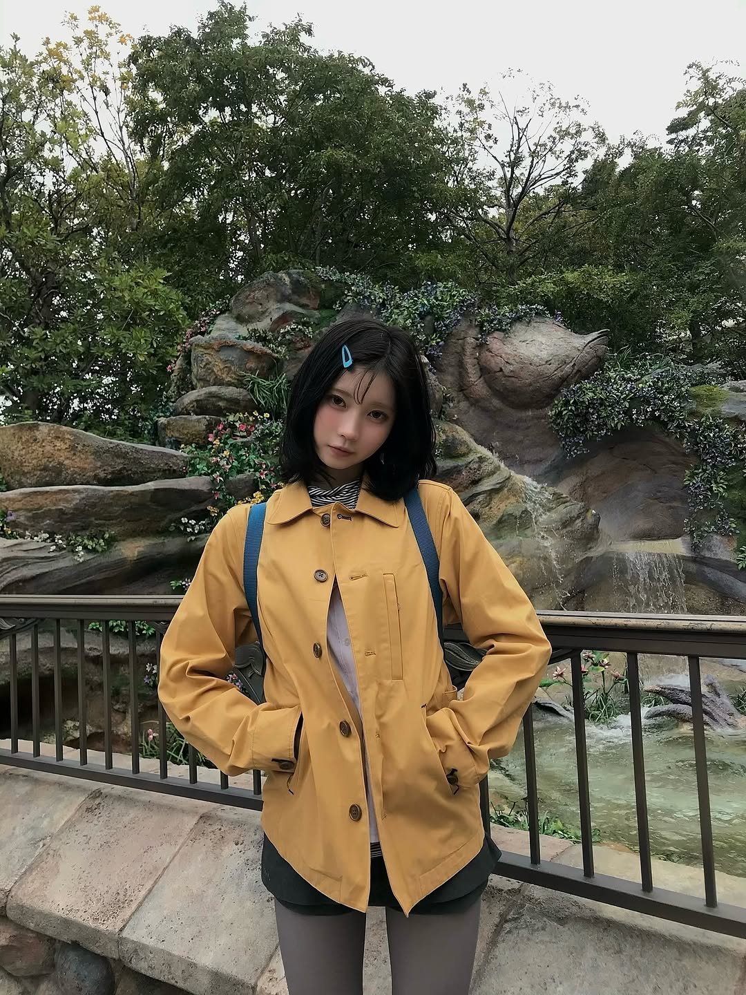 Photo by ENAMI ASA on November 12, 2025. May be an image of duffle coat, raincoat, parka, cloak, jacket and text.