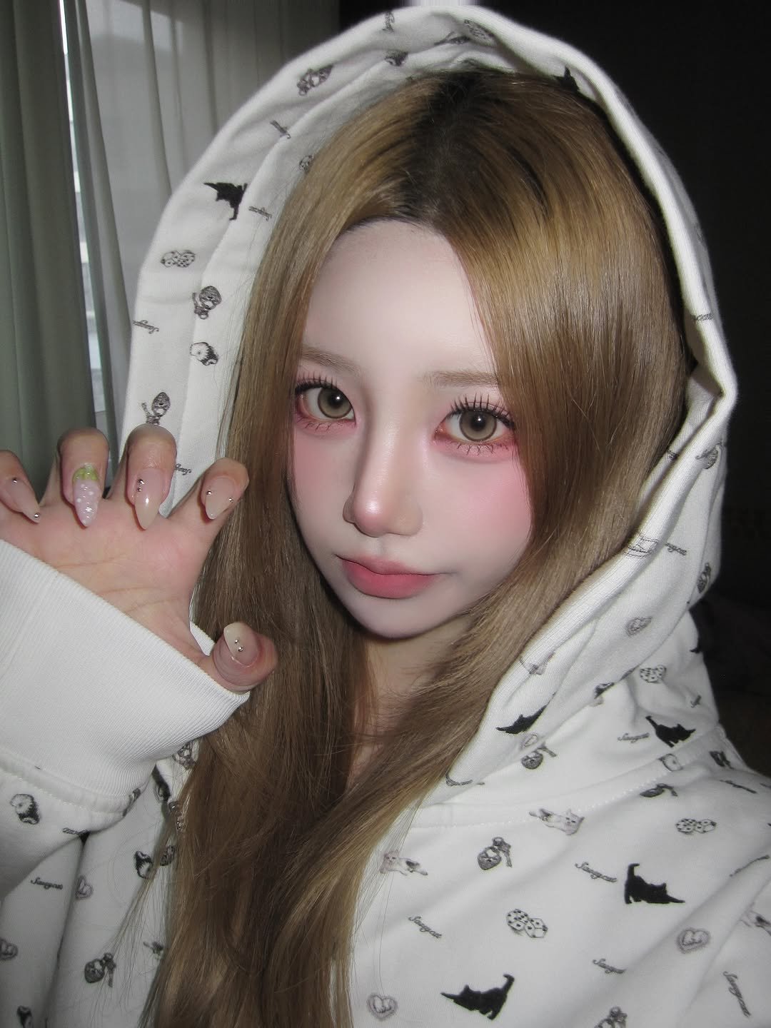 Photo shared by SUJIN ♥ on October 11, 2025 tagging @sonyounaclinic. May be an image of one or more people, hair, makeup, parka, bath robe and text.