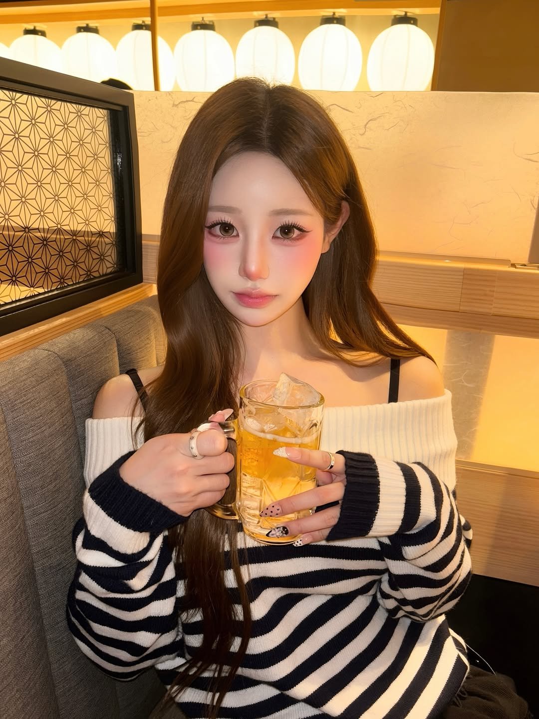 Photo by SUJIN ♥ on December 11, 2025. May be an image of one or more people, hair, beer, top and text.