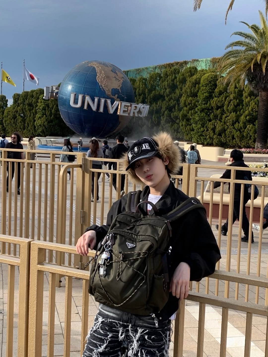 Photo shared by ENHYPEN on March 07, 2026 tagging @prada. May be an image of ‎globe and ‎text that says '‎UNIVIER UNIVIERSI រី AL 安 הורושו‎'‎‎.