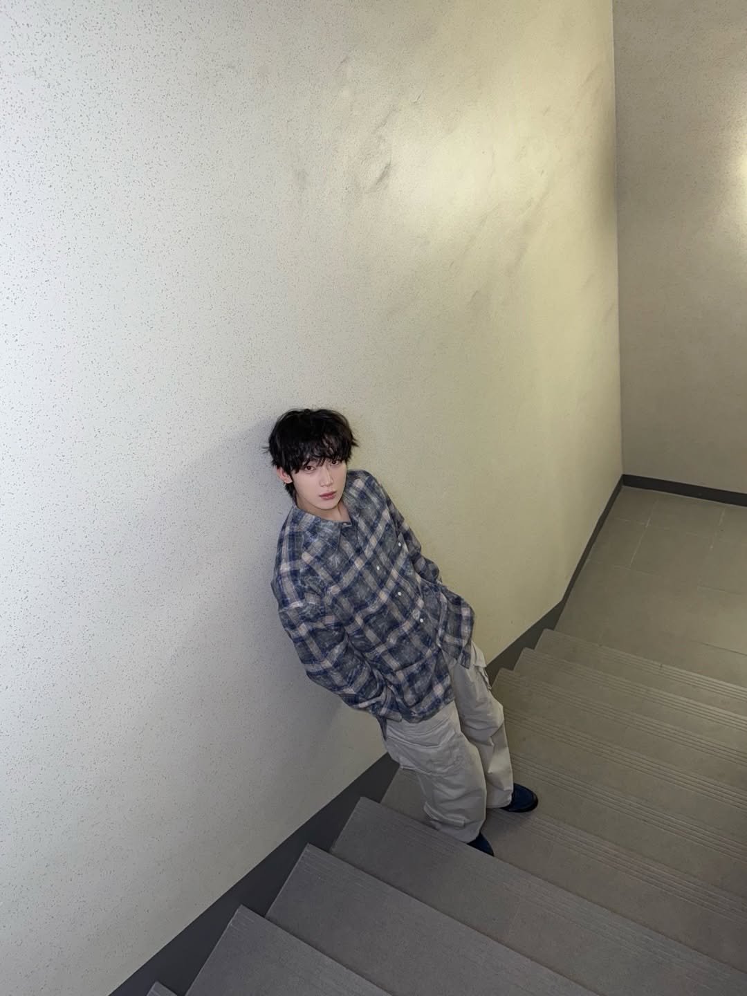 Photo by ENHYPEN on March 06, 2026. May be an image of child, duffle coat and text.