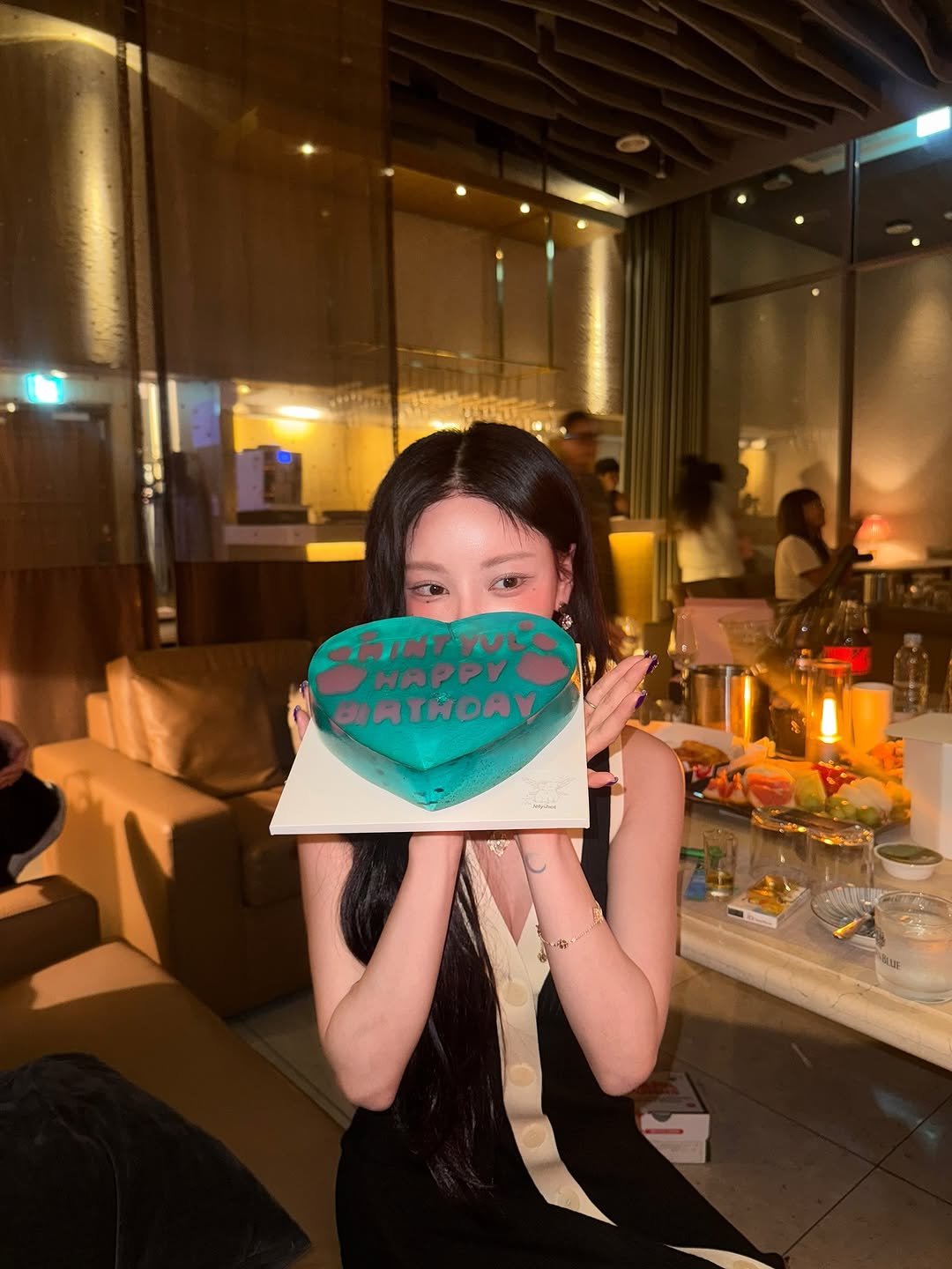 Photo by 김율 MINT on June 08, 2025. May be an image of purse and cake.