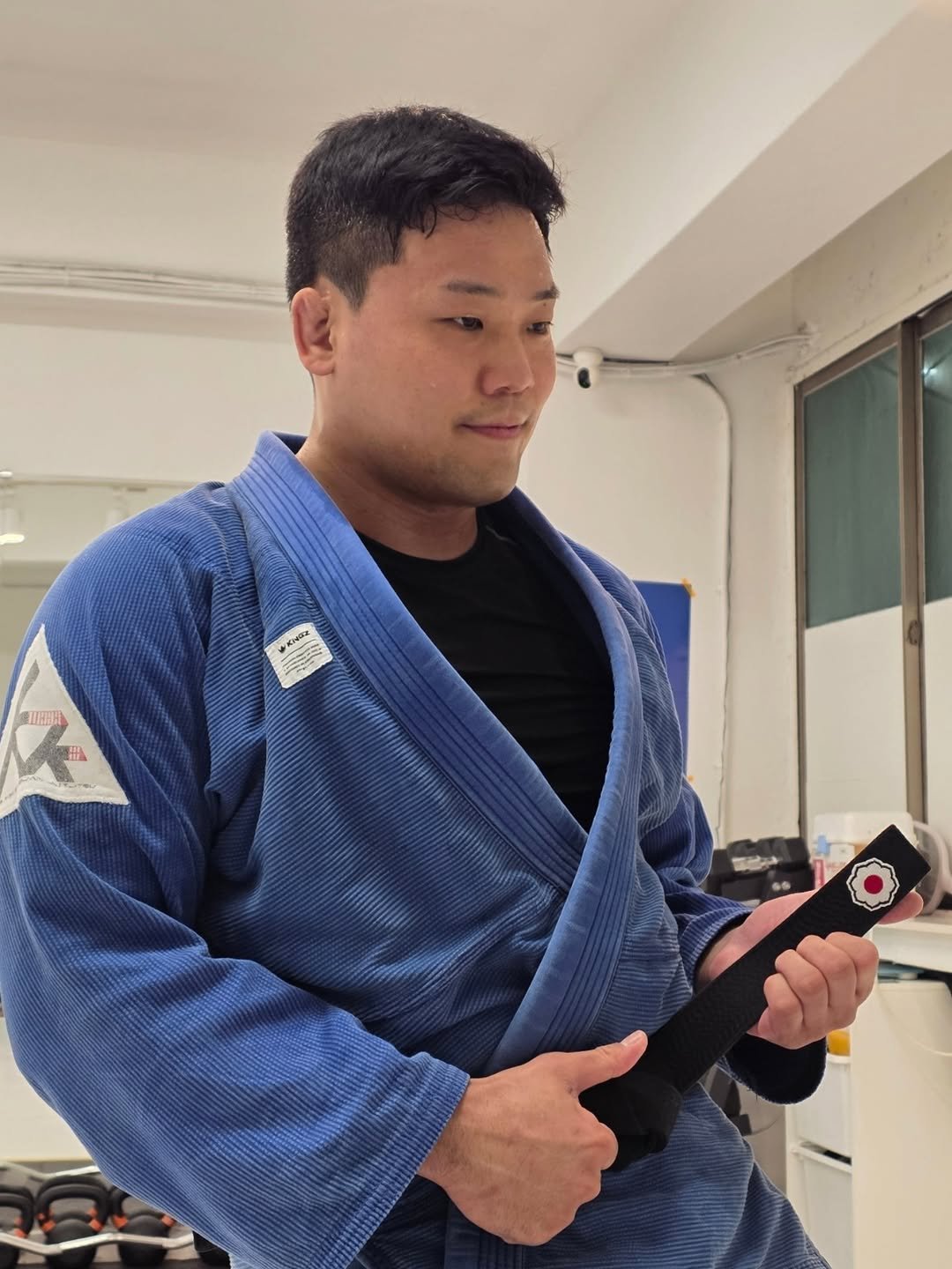 Photo shared by 박영재 on January 13, 2026 tagging @oh_ilkoo. May be an image of martial arts, bath robe, belt, punching bag and text.