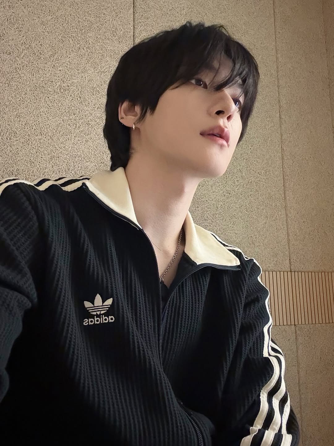 Photo by EPEX on March 26, 2026. May be an image of one or more people, bangs, top and text.