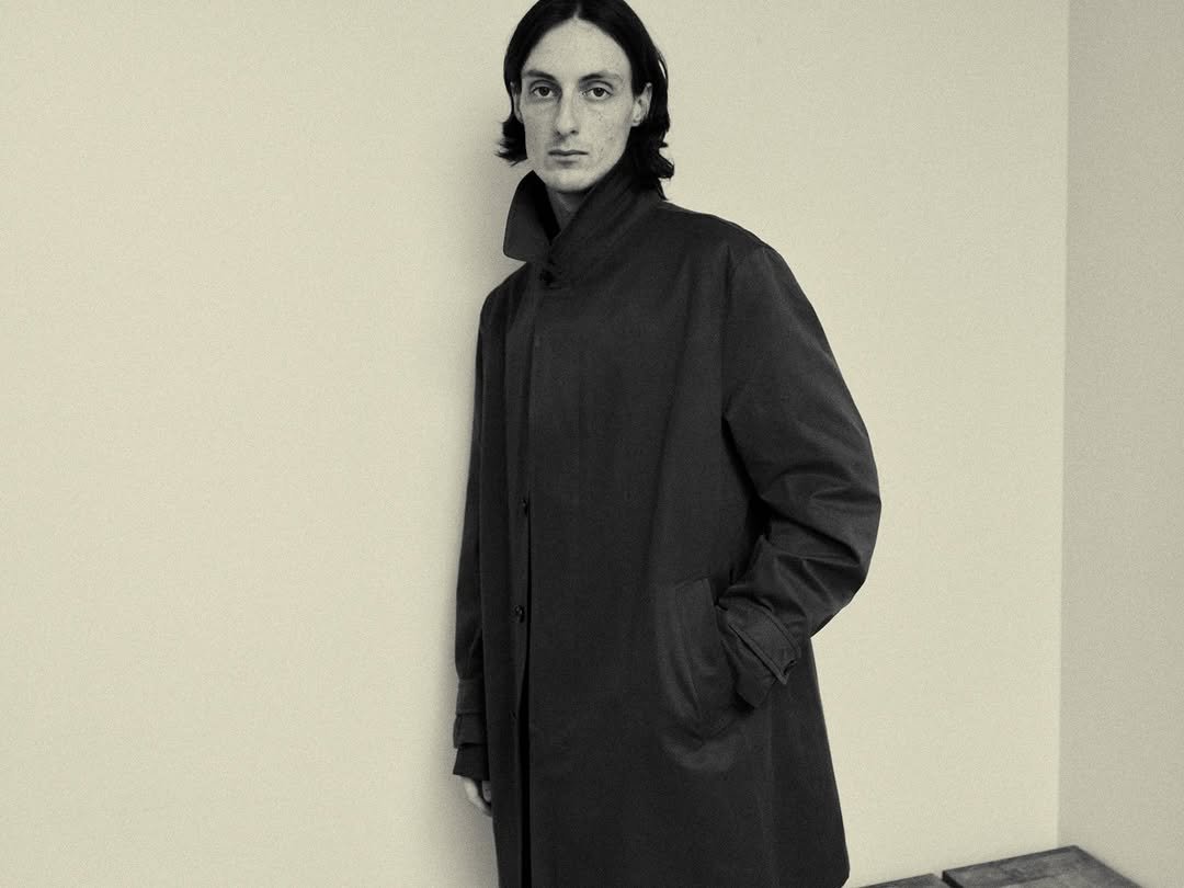 Photo by EPICENTER.TOURIST on February 27, 2026. May be a black-and-white image of duffle coat, overcoat, turtleneck and text.