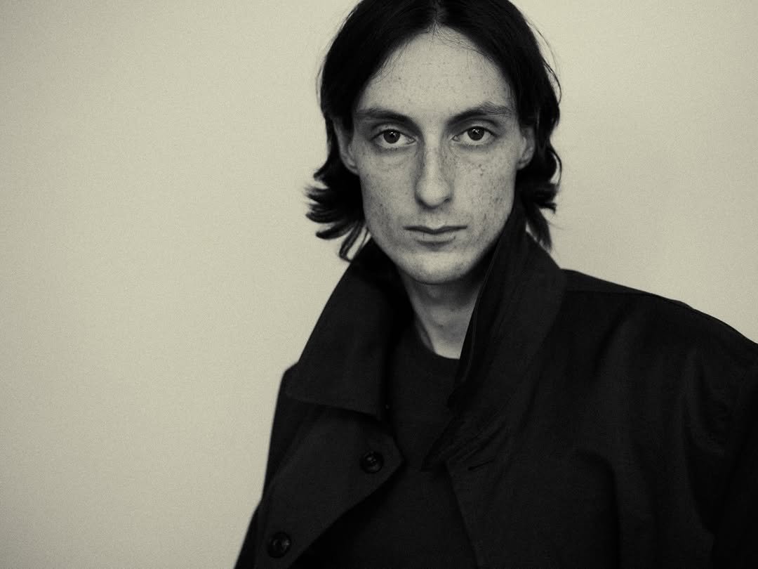 Photo by EPICENTER.TOURIST on February 27, 2026. May be a black-and-white image of one or more people, overcoat and text.