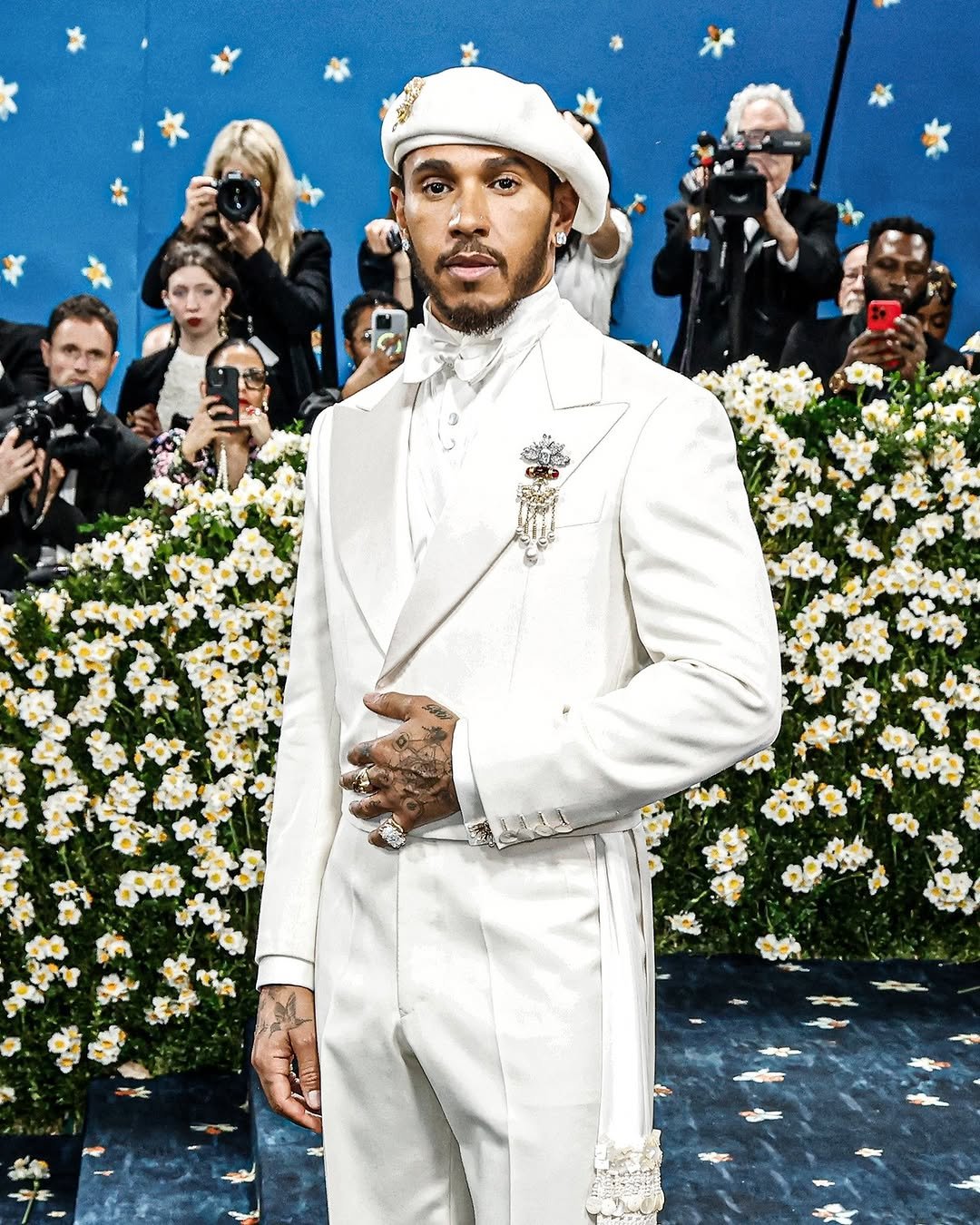 Photo by ESPN F1 on January 07, 2026. May be an image of dinner jacket and text.