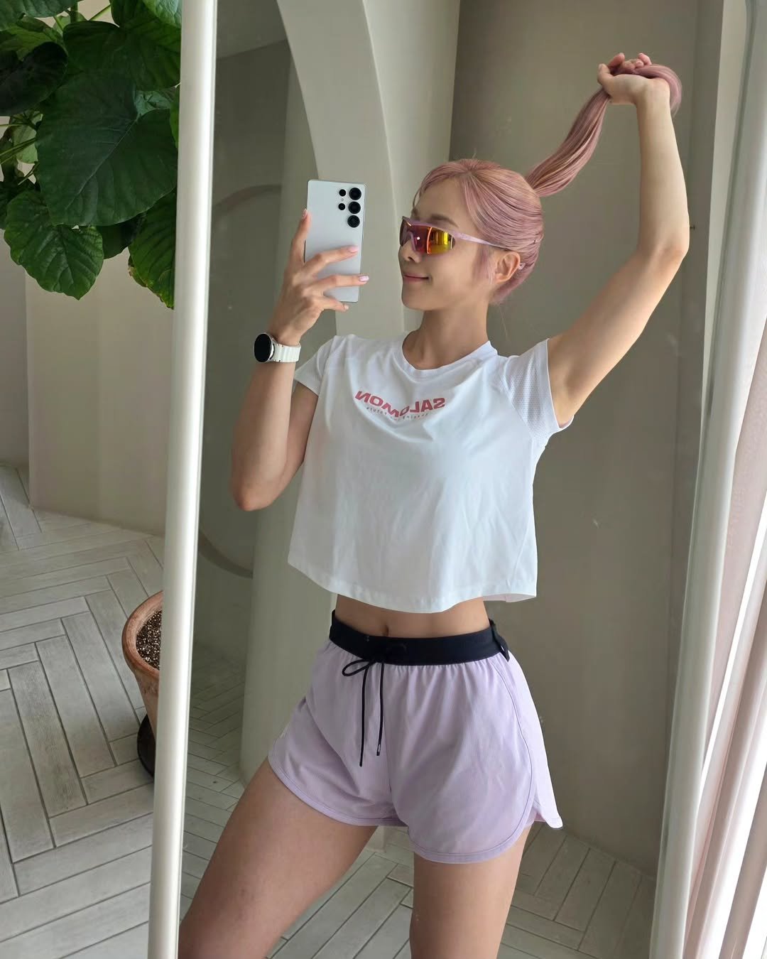 Photo shared by 심으뜸 on July 27, 2025 tagging @districtvision, @salomon_kr, and @kaleg.official. May be a selfie of 1 person, activewear, sleepwear, shorts, sweatpants, top, sportswear and text.