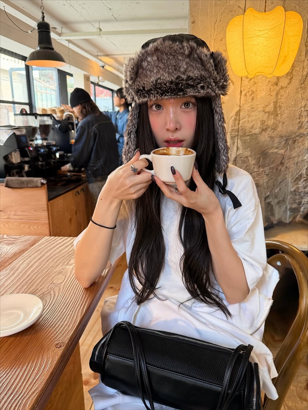 Photo by Eunji Hong on November 24, 2025. May be an image of hat, tea, beret, cornflower and text.