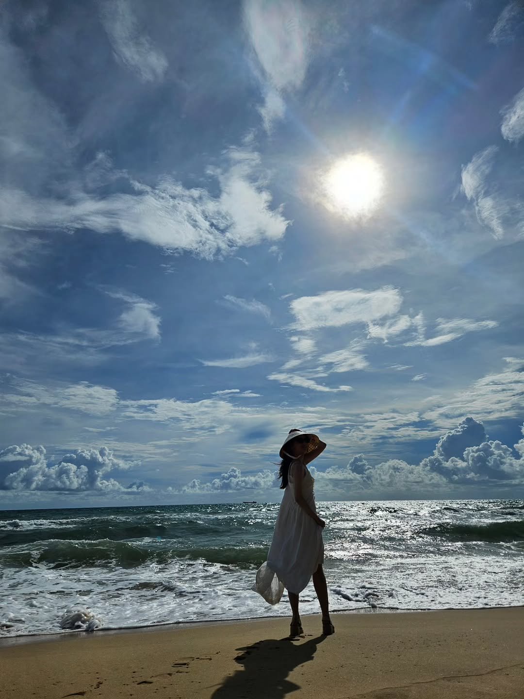 Photo by 박은빈 on October 05, 2025. May be an image of 1 person, ocean, water, beach, cloud and text.