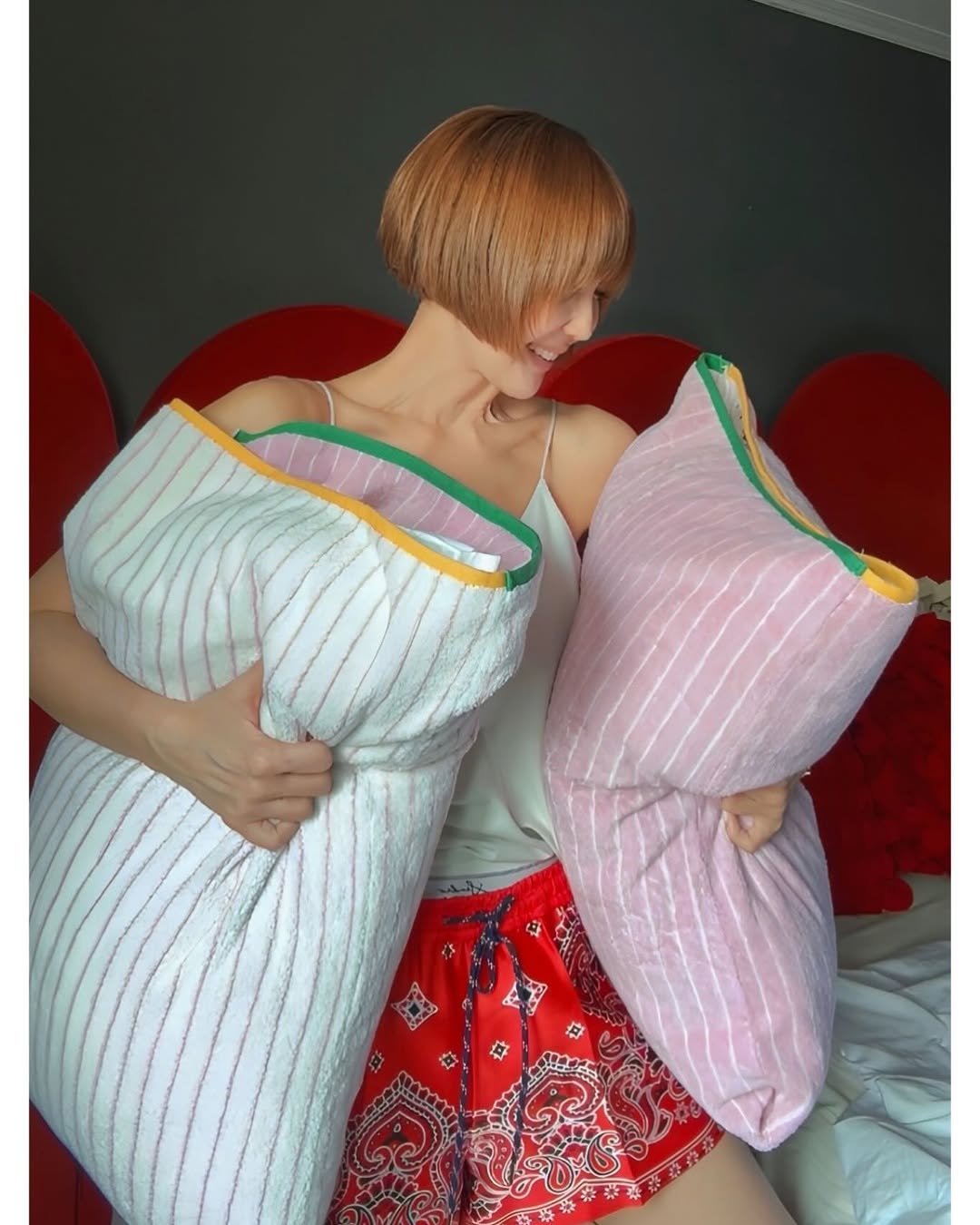 Photo by 최은경 아나운서 on August 10, 2025. May be an image of 1 person, sleepwear, diaper, mattress, beanbag chair, bath robe and text.