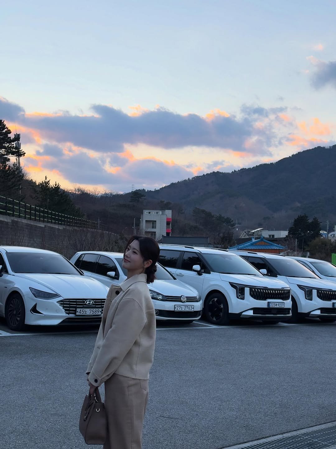 Photo by 박은우 on July 20, 2025. May be an image of 1 person, car, suit, road and text.