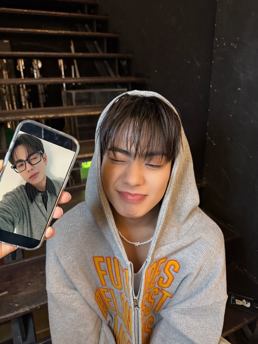 Photo by EVNNE on March 20, 2026. May be a selfie of one or more people, bangs, phone, top and text.