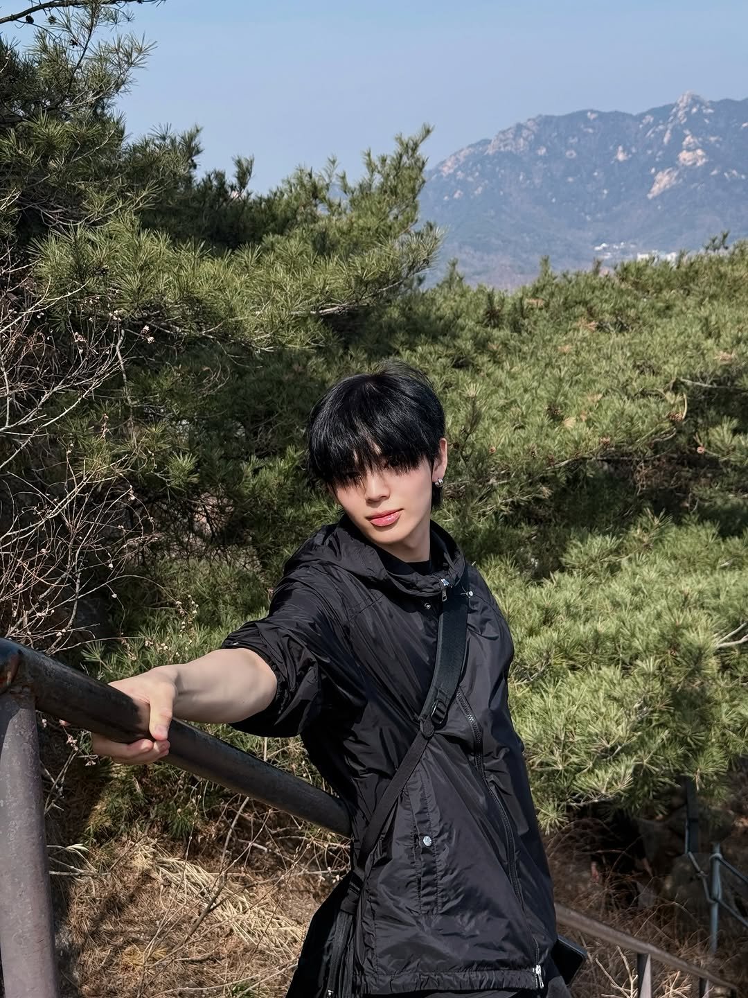 Photo by EVNNE on March 24, 2026. May be an image of one or more people, makeup, outdoors and text.