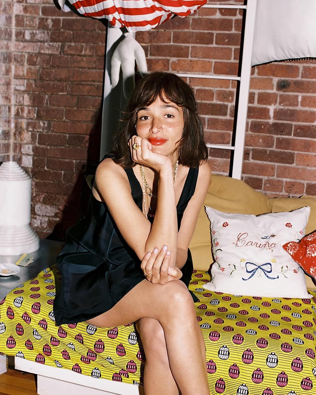 Photo shared by eyesmag 아이즈매거진 on April 28, 2026 tagging @lailacooks, and @arketofficial. May be an image of one or more people, makeup, slip, sleepwear, dress, chaise lounge and text.