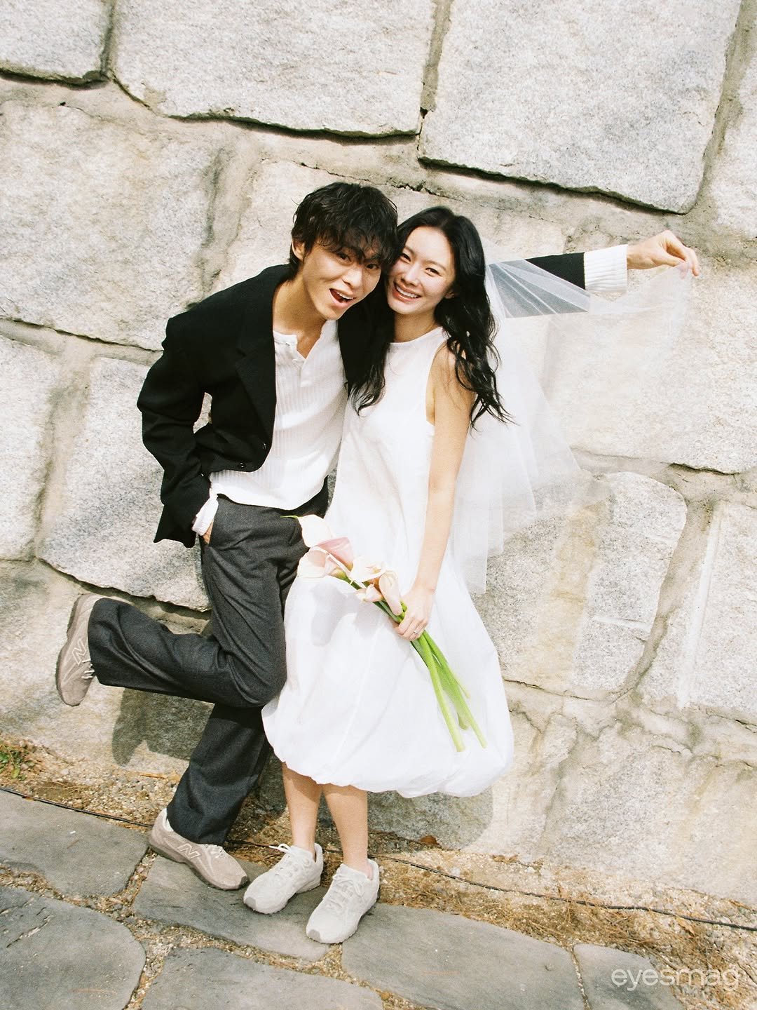 Photo shared by eyesmag 아이즈매거진 on February 23, 2026 tagging @hyejxong__, @_9.mg_, and @newbalancelifestyle. May be an image of one or more people, dress, prairie gentian, wedding and text.