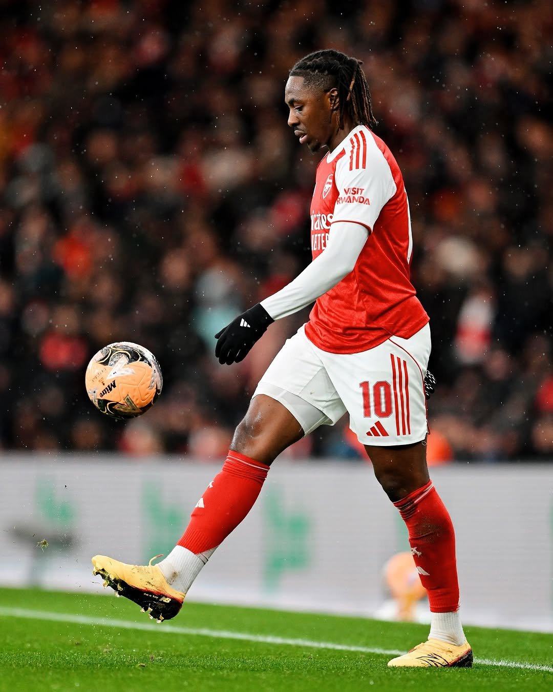 Photo shared by Ebere Eze on February 15, 2026 tagging @arsenal, and @newbalancefootball. May be an image of football, soccer, cleats, sports equipment, stadium and text.