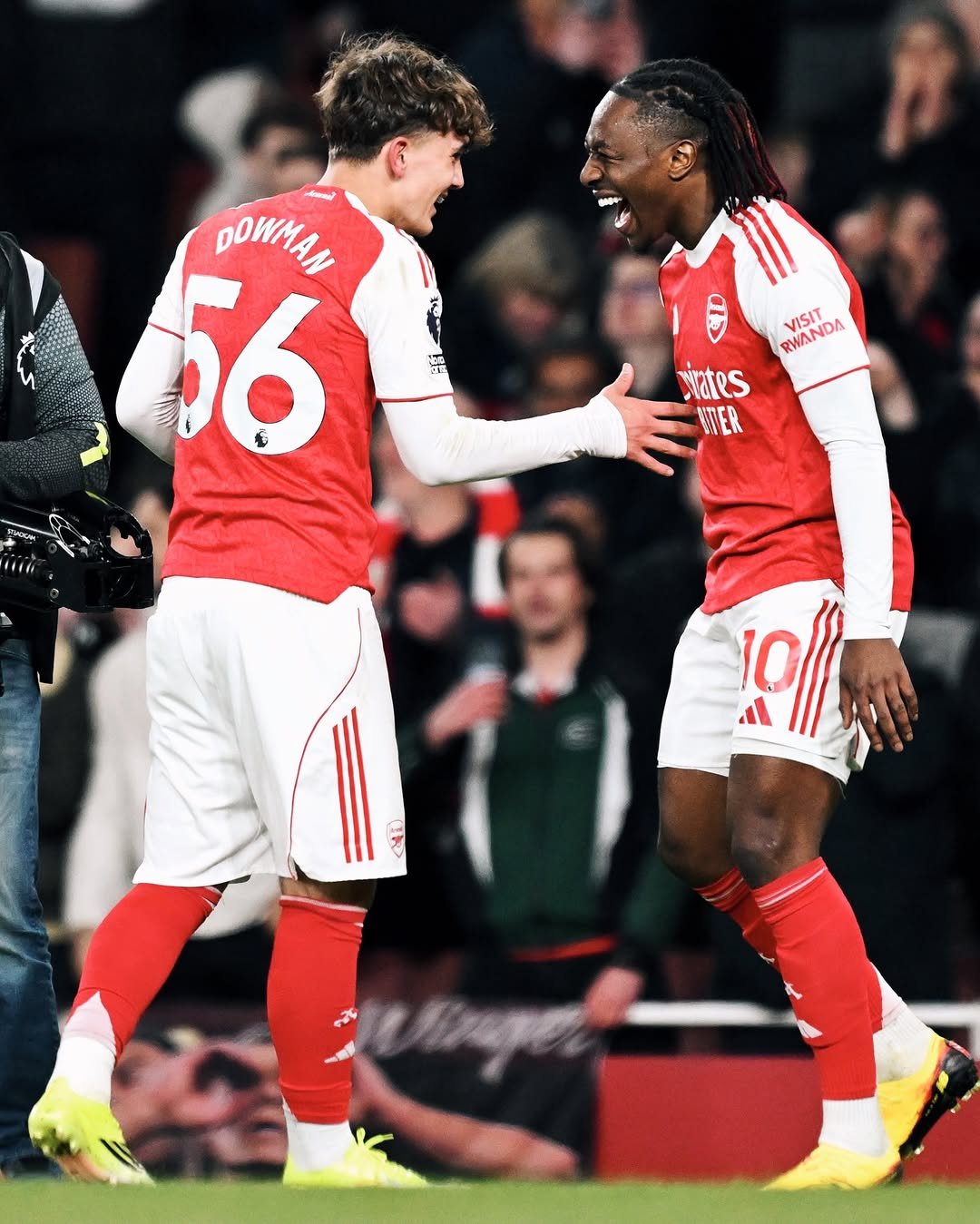 Photo shared by Ebere Eze on March 14, 2026 tagging @arsenal, and @maxdowman. May be an image of football, soccer, stadium and text that says 'SER DOWMAN 56 VISIT RWANDA ates WVER 10l'.