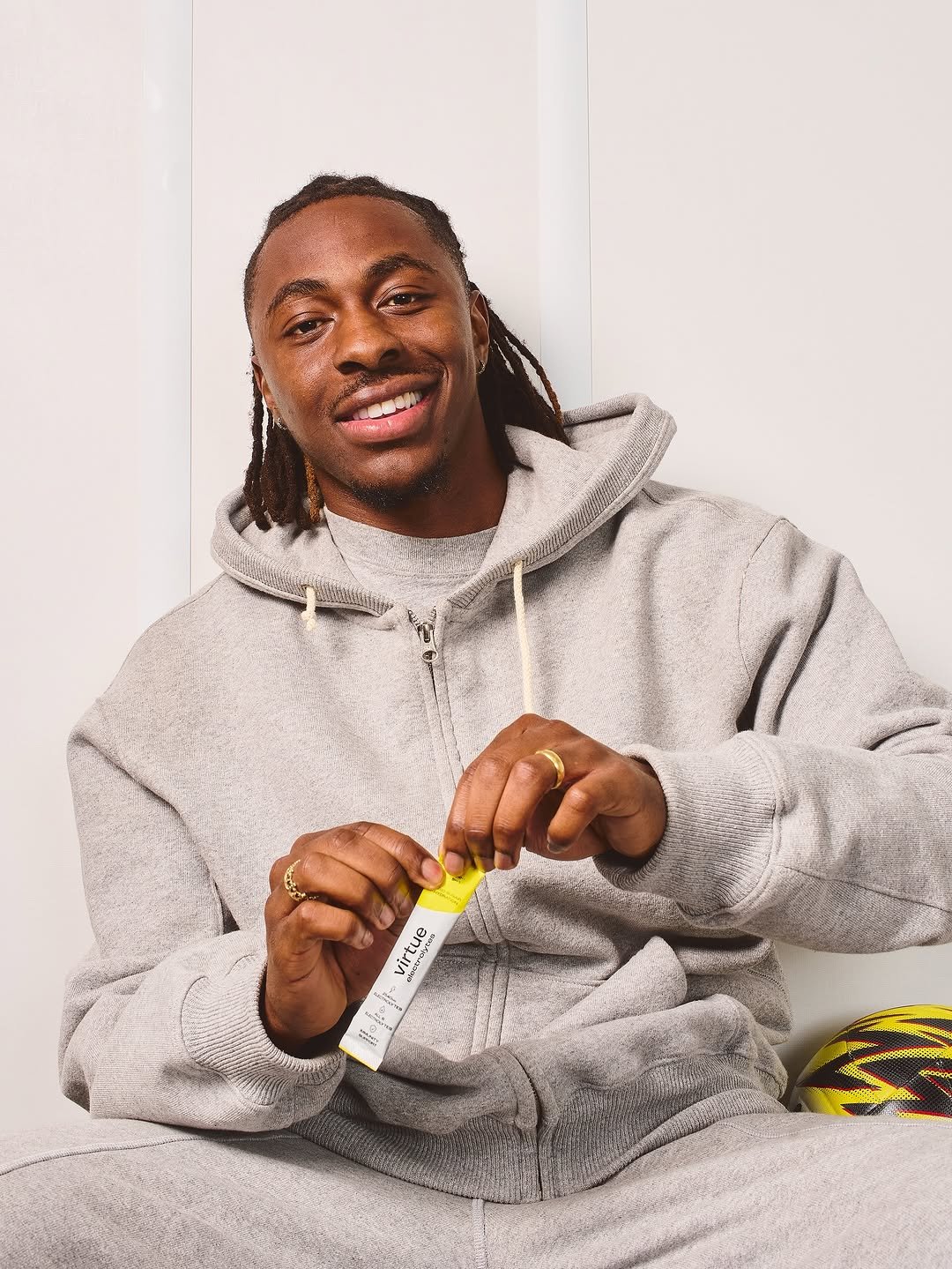 Photo shared by Ebere Eze on November 24, 2025 tagging @virtuedrinks. May be an image of drawstring, fleece, sweater, sweatpants, sweatsuit and text.