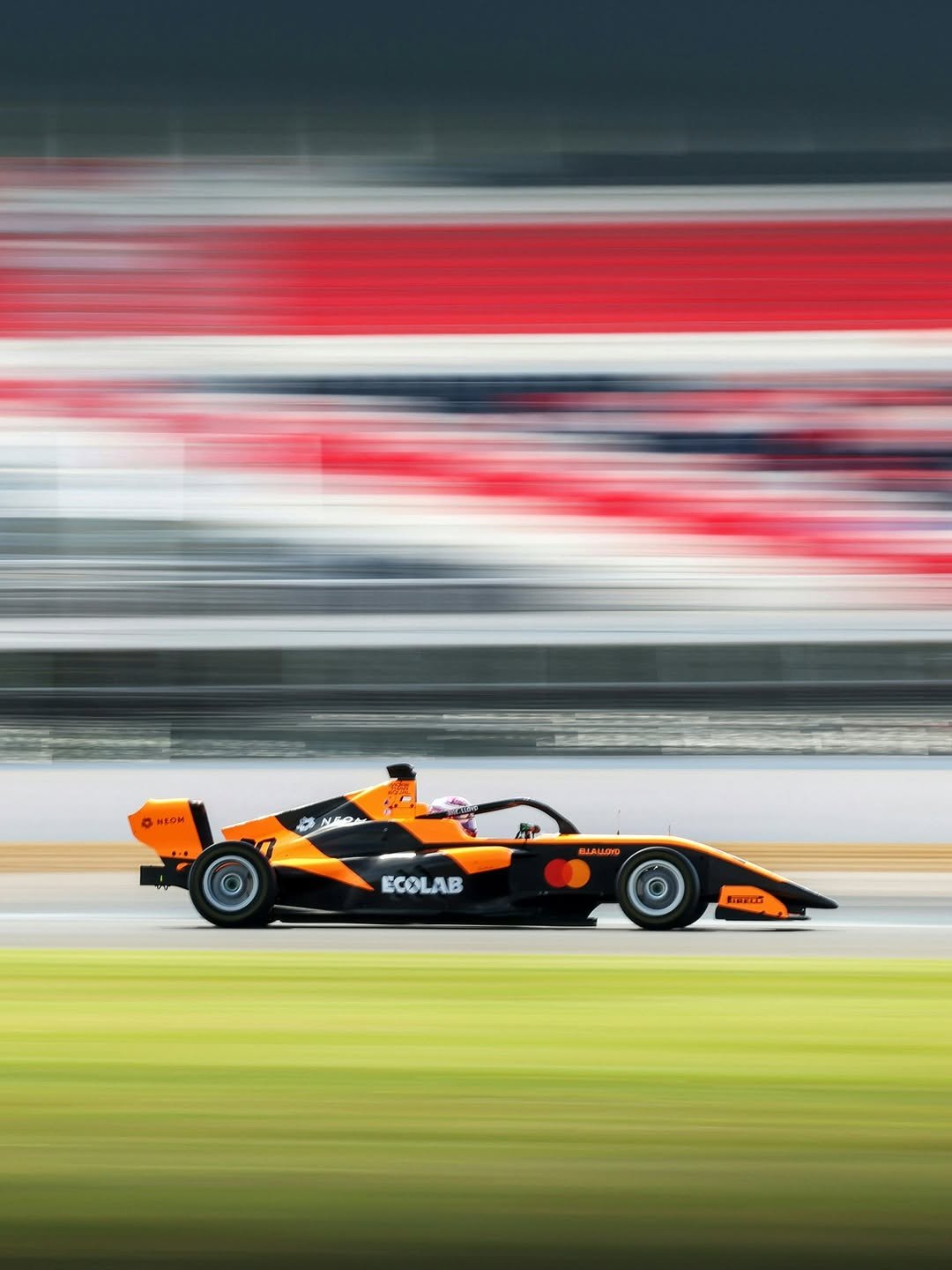 Photo shared by F1 Academy on April 27, 2026 tagging @ellalloyd. May be an image of racing vehicles, race car and text.