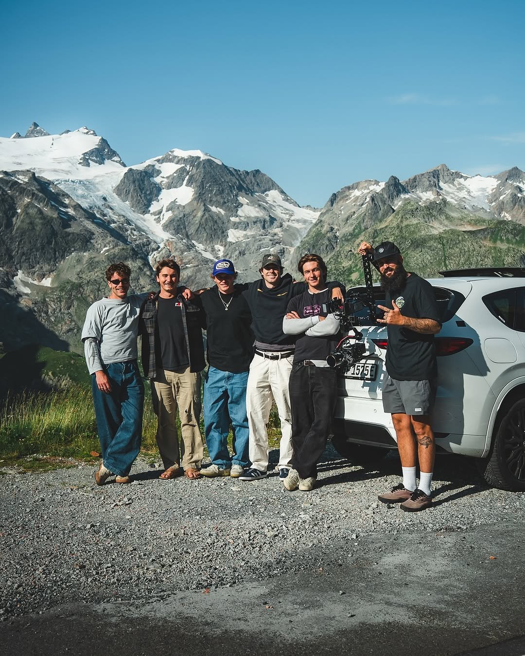 Photo shared by Fabio Minnig on September 02, 2025 tagging @dbozz3, @mr.owen.fox, @gregoireschwab, @nick_broms, @zimydakid, and @adrienpaynel. May be an image of 6 people, people camping, mountain and text.