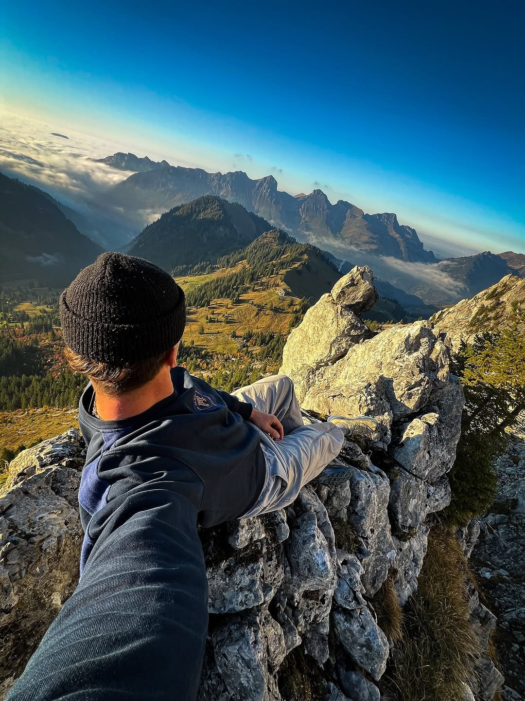 Photo by Fabio Minnig on October 31, 2025. May be an image of climbing, mountain, fog and text.