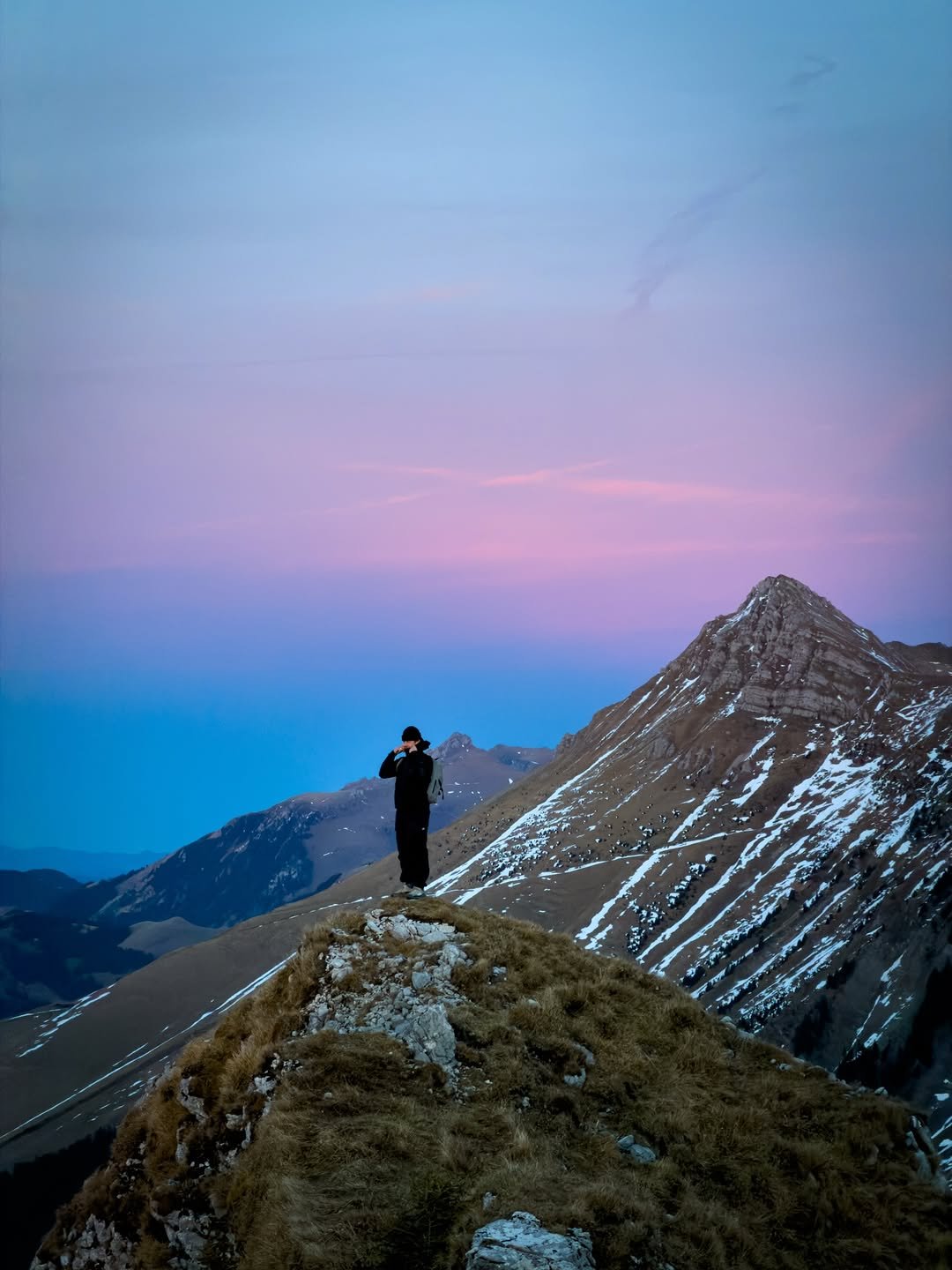 Photo by Fabio Minnig on December 26, 2025. May be an image of nature, mountain, twilight and text.