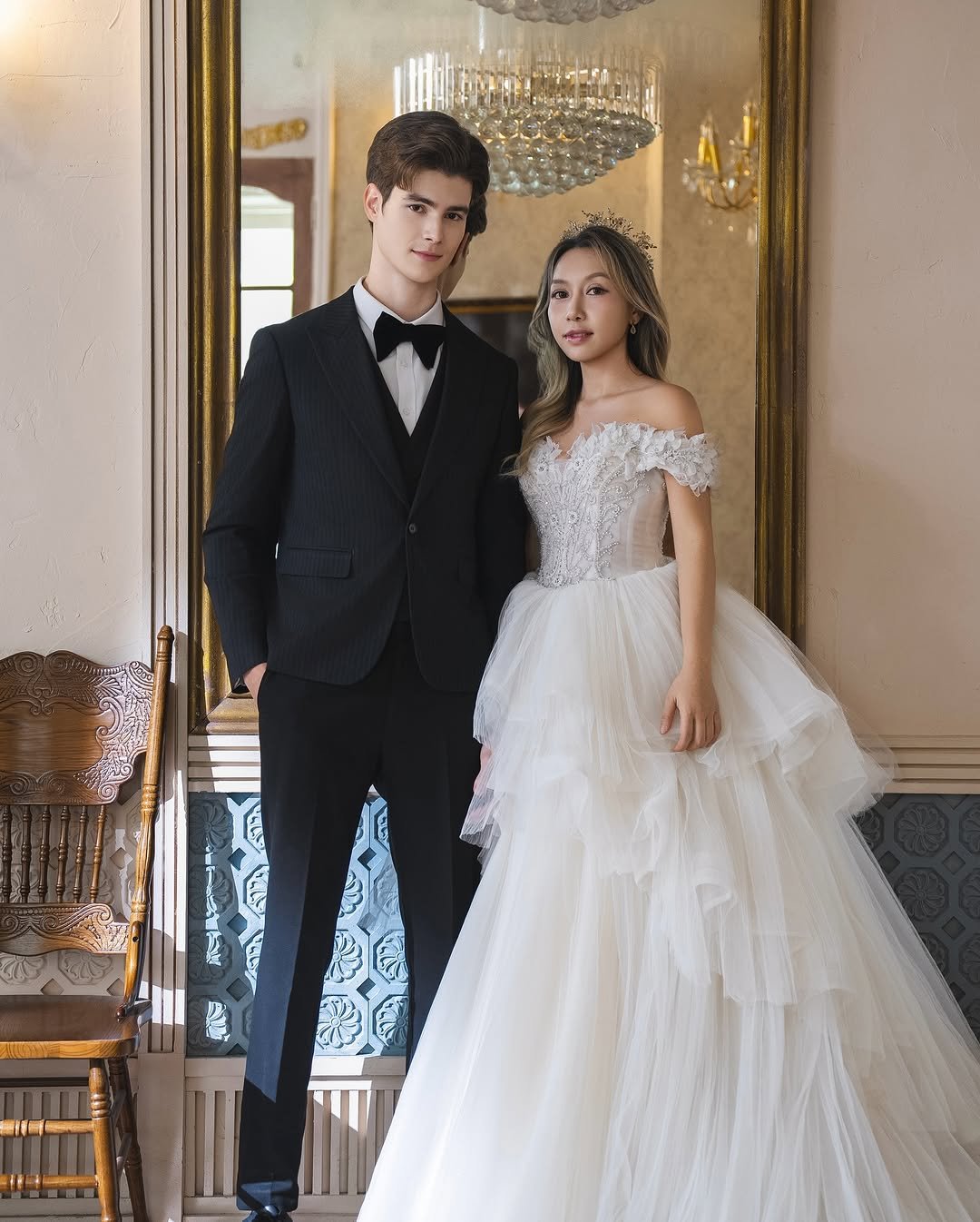 Photo by Ruslan Mamlay on September 22, 2025. May be an image of 2 people, dress, gown, dinner jacket, wedding and text.