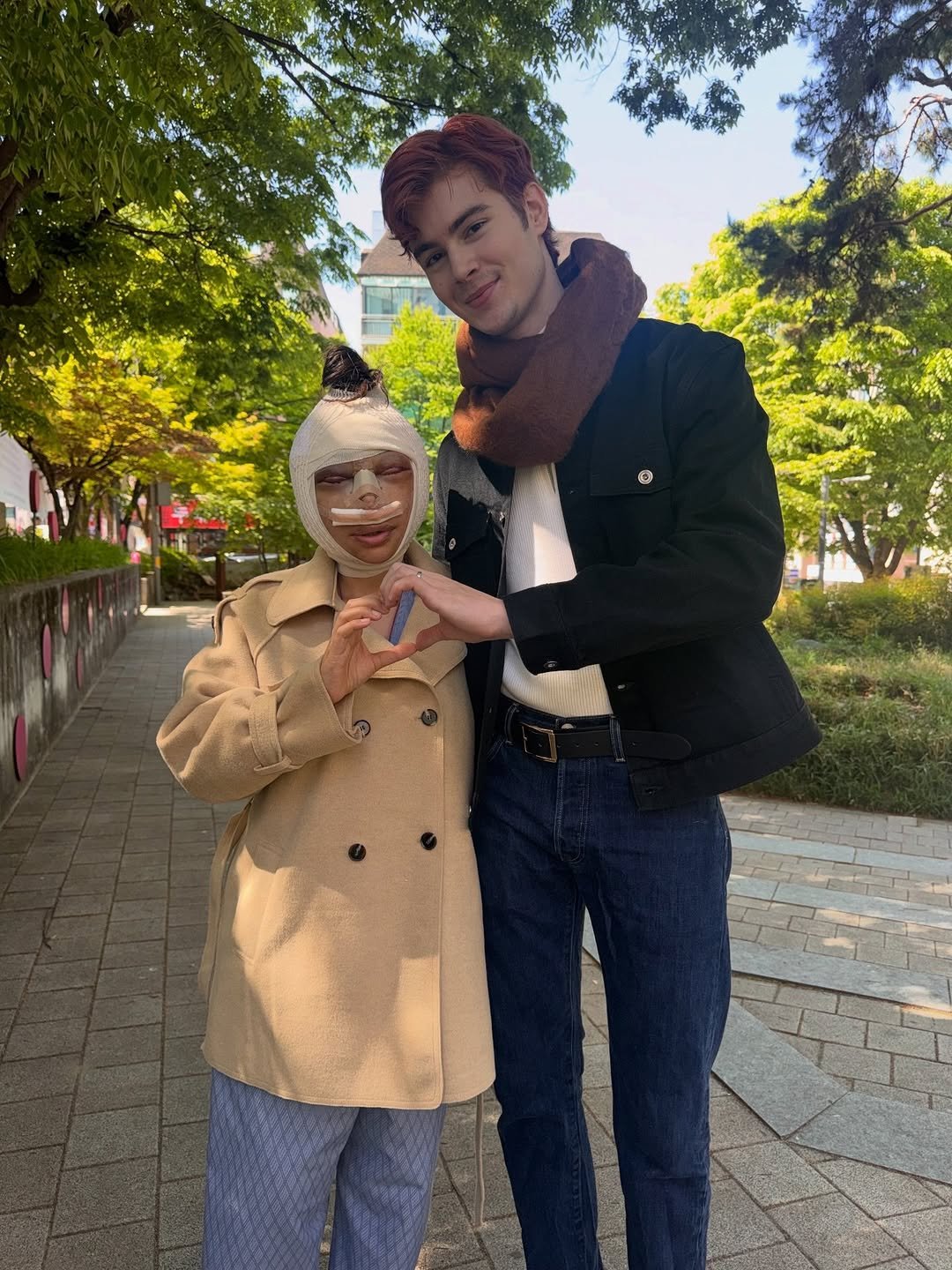 Photo shared by Ruslan Mamlay on April 23, 2026 tagging @pugun.wisad. May be an image of one or more people, duffle coat, overcoat, costume, turtleneck, scarecrow, parka and text.