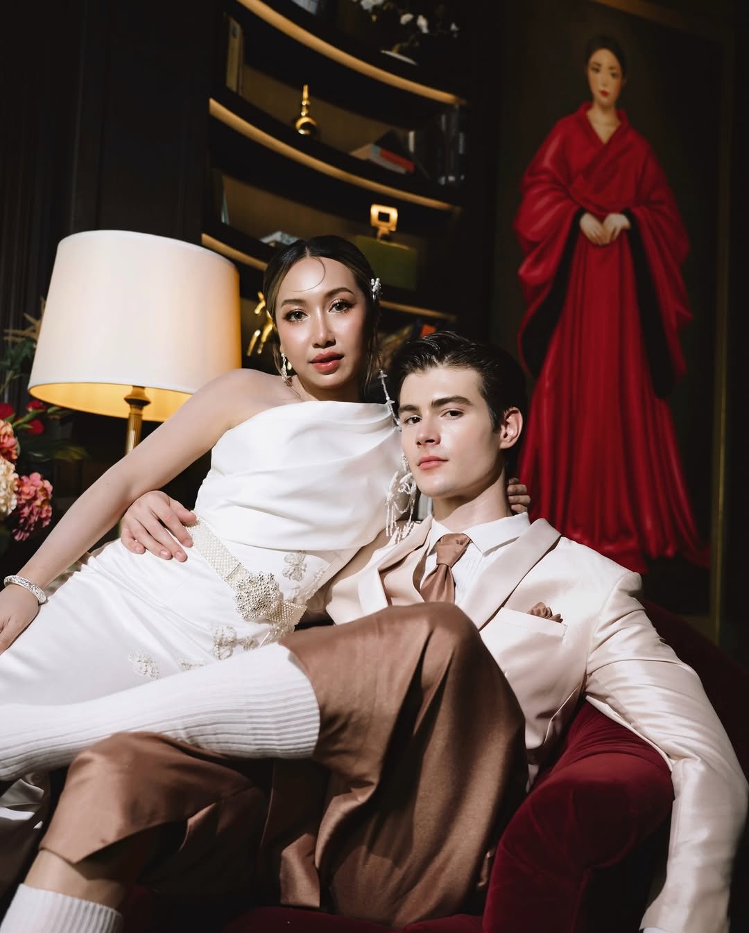 Photo shared by Ruslan Mamlay on November 20, 2025 tagging @pugun.wisad. May be an image of one or more people, makeup, suit, dinner jacket, dress, wedding and text.