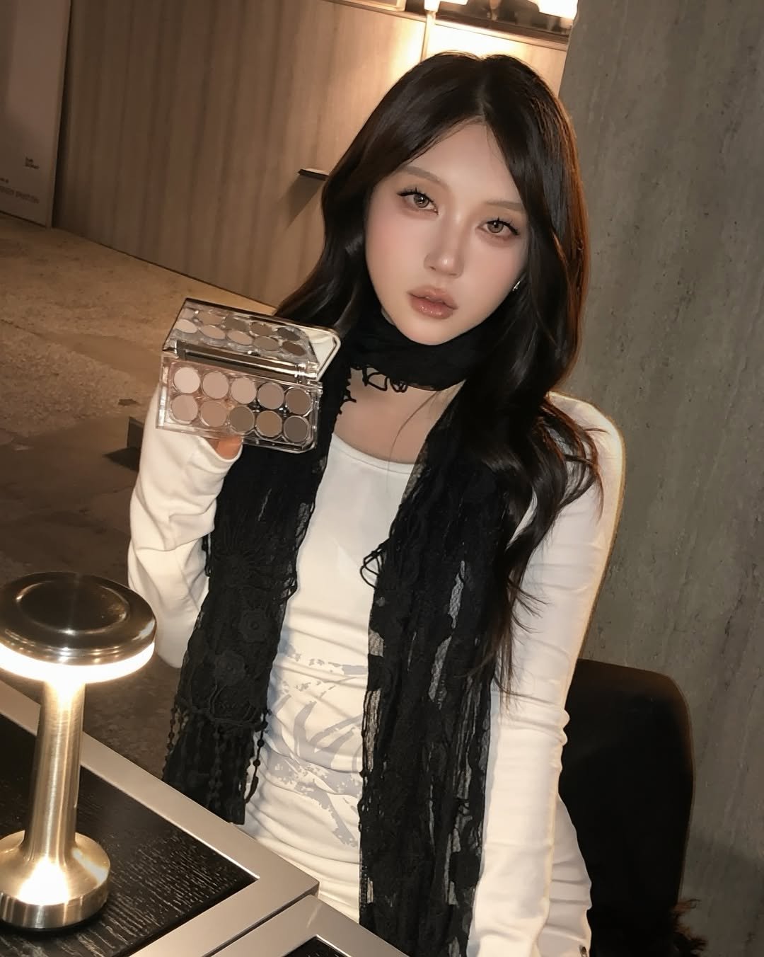 Photo shared by 동화 on December 31, 2025 tagging @lummir_makeup. May be an image of one or more people, makeup, hair, phone, choker, necklace, turtleneck and text.