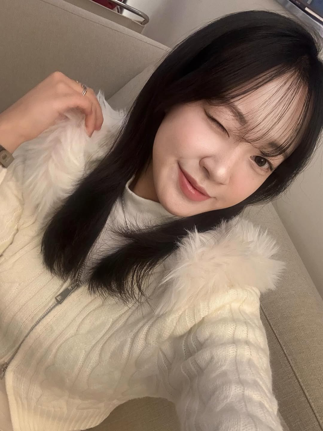 Photo by 묘정🐰 on December 05, 2025. May be a selfie of one or more people, hair, parka, top, turtleneck and text.