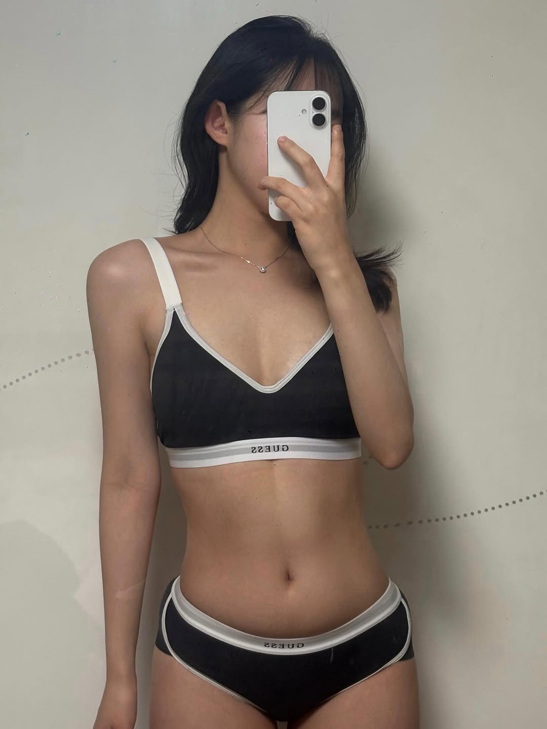 Photo shared by 묘정🐰 on February 12, 2026 tagging @guessunderwear.kr. May be an image of sleepwear, bra and text.