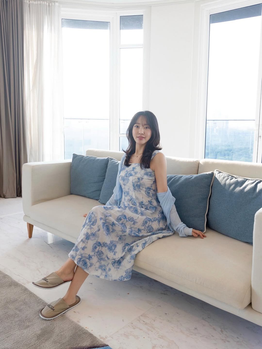 Photo shared by 묘정🐰 on February 11, 2026 tagging @station_by_uhc, and @uh_flat_malaysia. May be an image of sleepwear, sundress, dress and text.