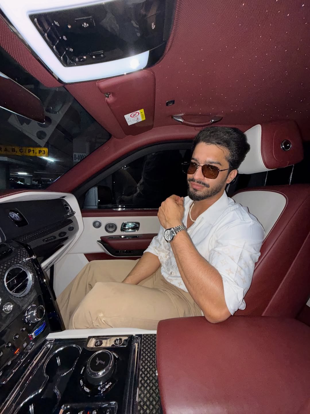 Photo by Faiz Baloch on November 27, 2025. May be an image of one or more people, car, wrist watch, limousine and text.