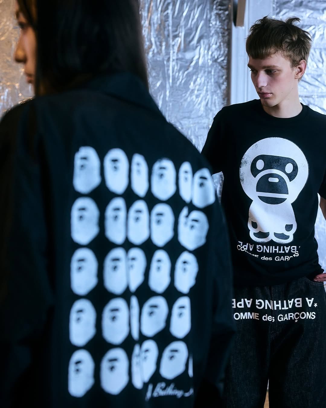 Photo shared by fake magazine 페이크 매거진 on April 26, 2026 tagging @bape_japan. May be an image of ‎fleece, flight jacket, parka, sweatshirt and ‎text that says '‎ਕੂੰ dado שרי E เย' des GAR 0300 AAE OMME de; GARÇONS IRag‎'‎‎.