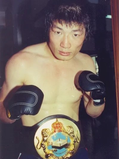 Photo by fake magazine 페이크 매거진 on April 27, 2026. May be an image of martial arts, belt, punching bag and text.