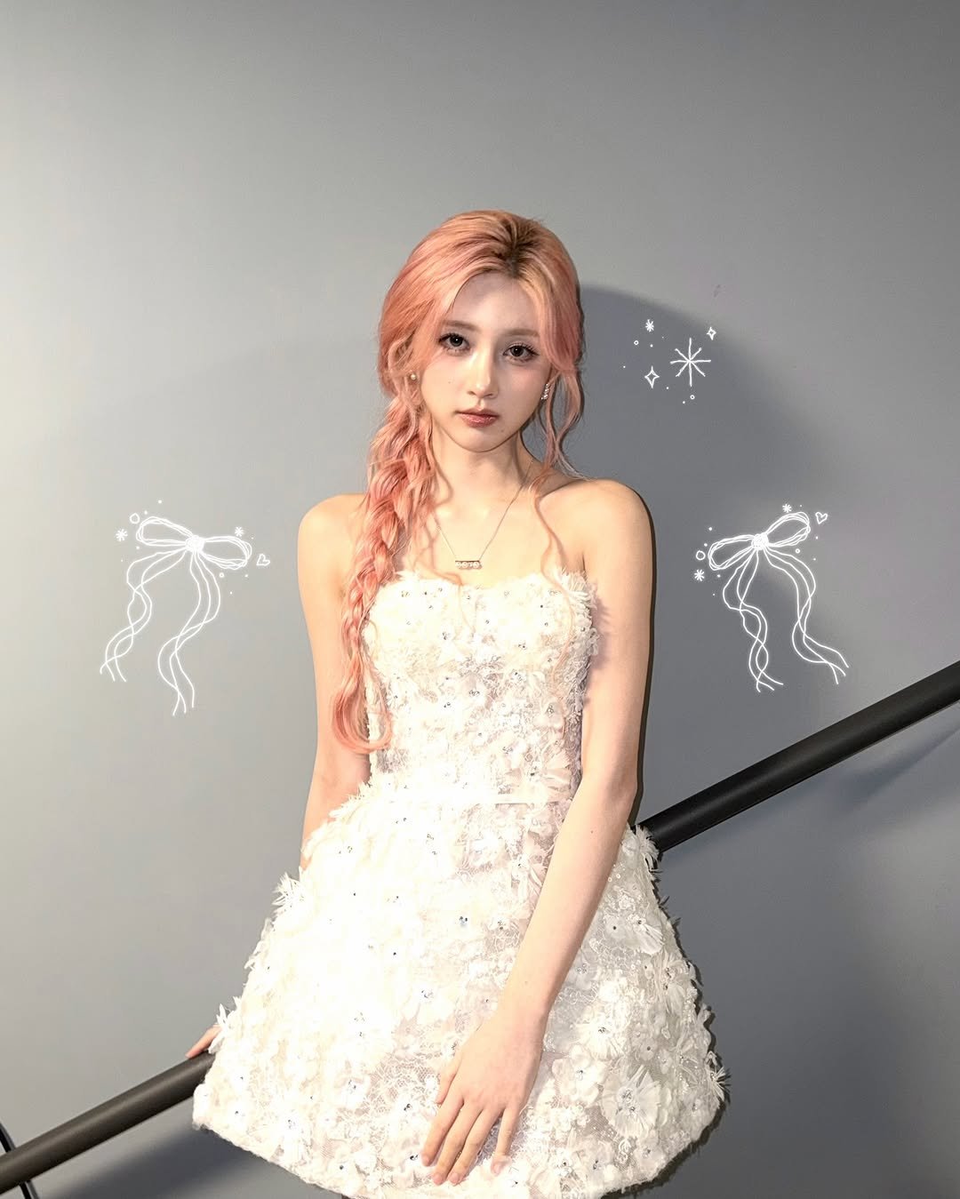 Photo by 가을 GAEUL on January 13, 2026. May be an image of one or more people, hair, dress and text.