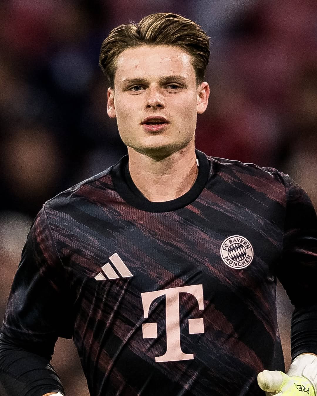 Photo by FC Bayern on September 23, 2025. May be an image of 1 person, playing football, playing soccer, sports equipment, stadium and text.