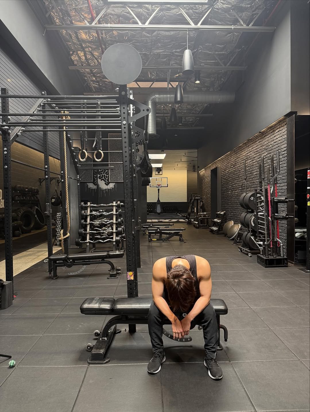 Photo shared by 이찬 on October 16, 2025 tagging @dogpound. May be an image of one or more people, biceps, people bodybuilding, treadmill, barbell, dumbbell and punching bag.