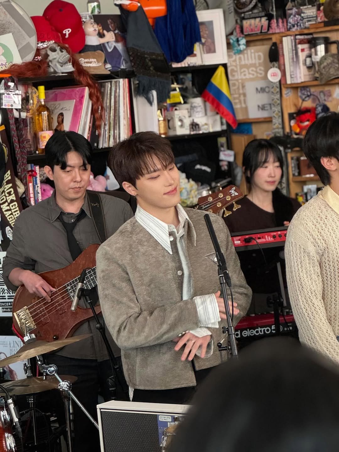 Photo shared by 이찬 on November 25, 2025 tagging @nprmusic. May be an image of one or more people, bangs, concert and text.